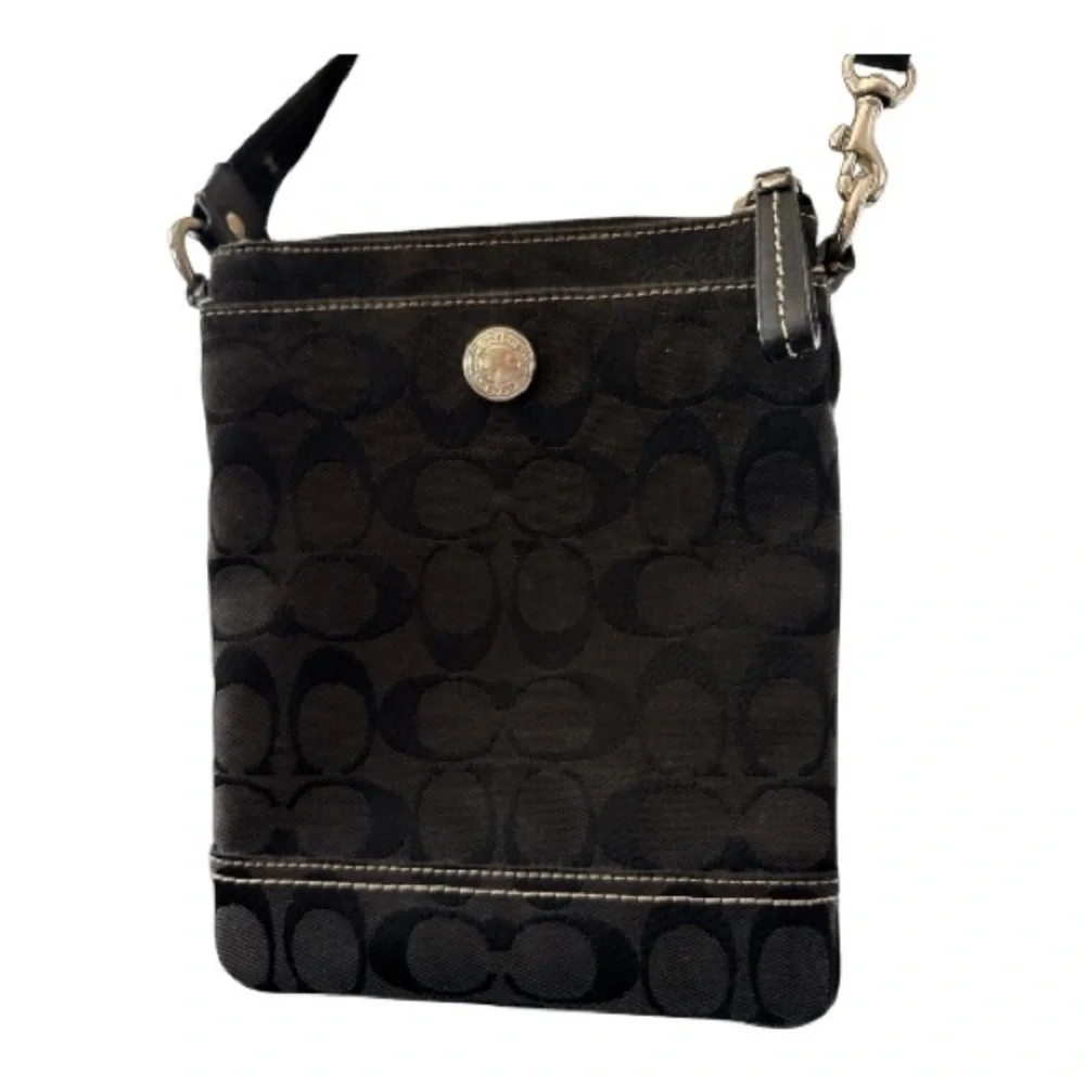 COACH vintage crossbody bag, jacquard black, adjustable strap, zipper top.